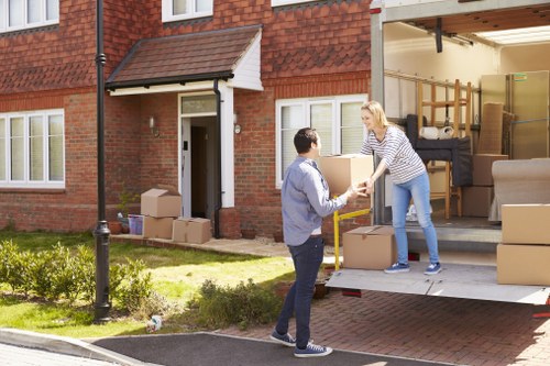 Careful loading of household items during a Whetstone flat removal