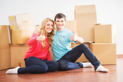 Packing boxes and preparing furniture for a flat move in Whetstone